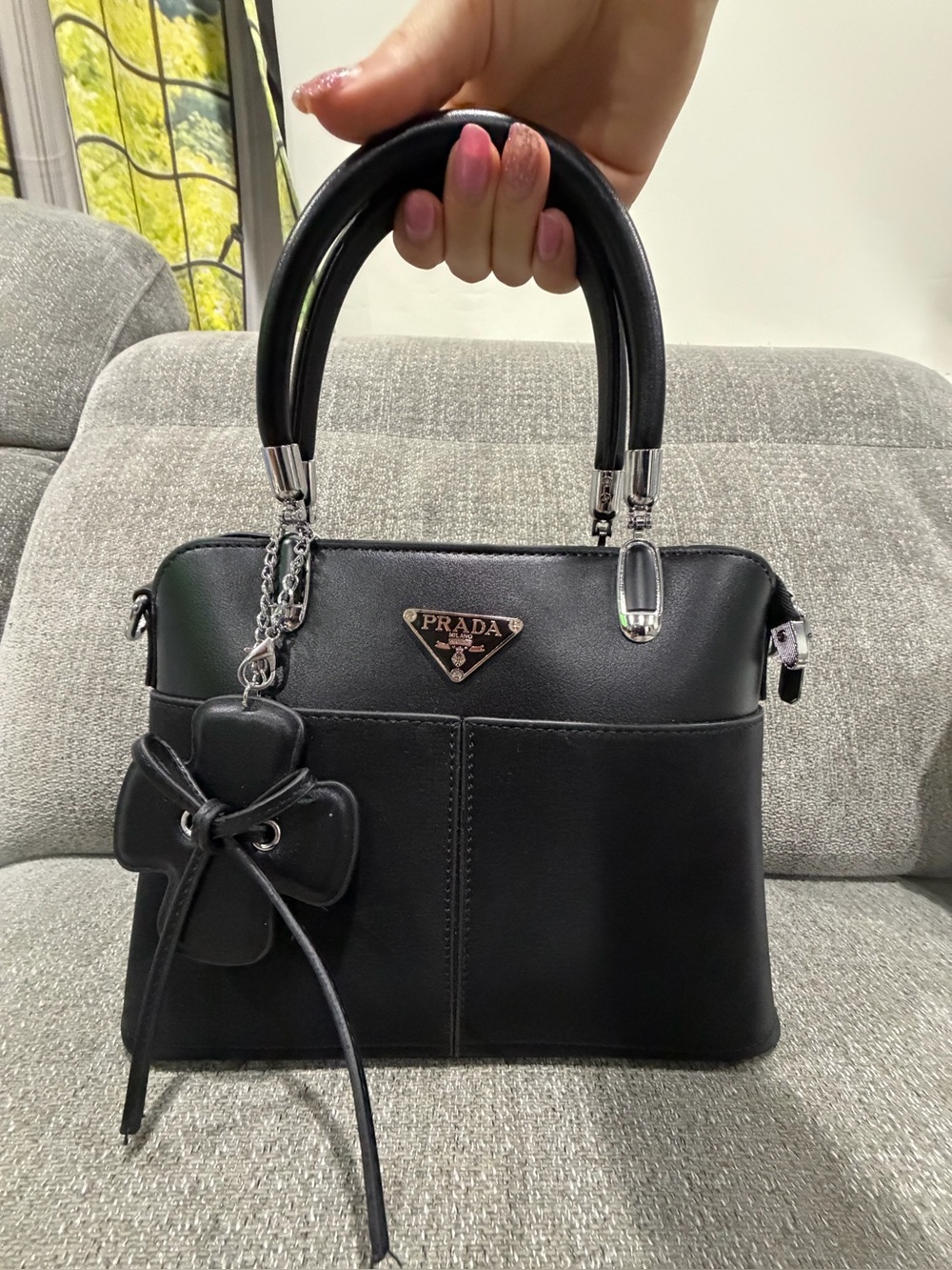 Prada Black Leather Satchel with Floral Charm